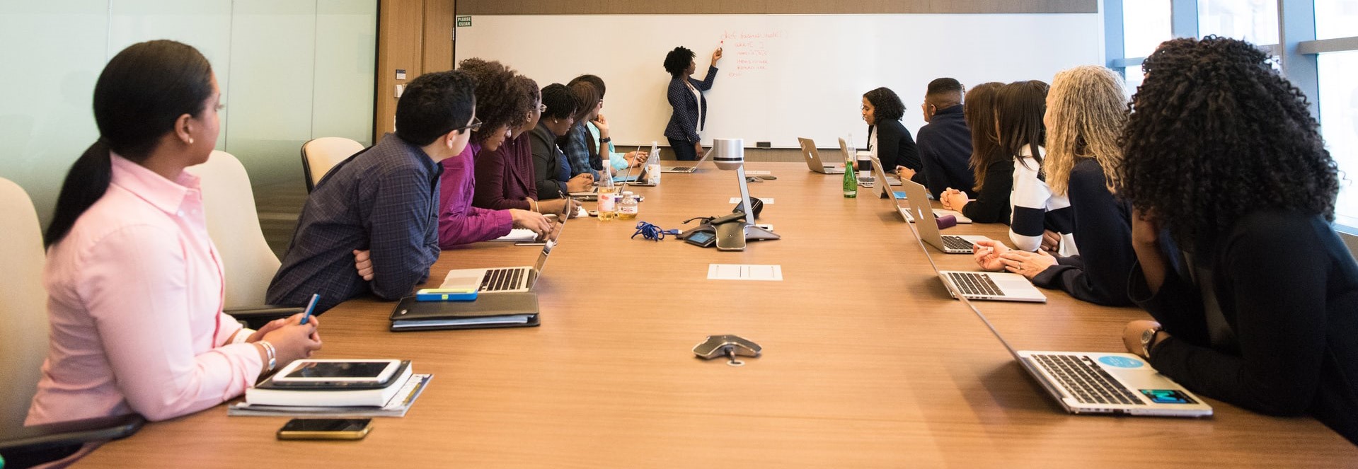 Woman leads corporate meeting